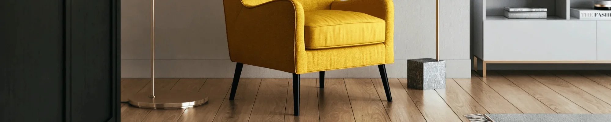 Yellow accent chair in a living room with hardwood flooring