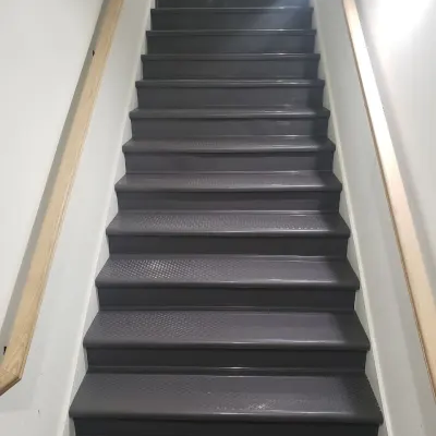 Commercial flooring on stairs installed by Absolute Flooring Inc